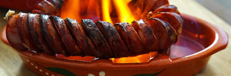 The Portuguese Chouriço: Varieties, Traditions & Flambé in a Clay Assador
