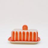 Beurrier en céramique rayé orange et blanc Beurrier rayé "Costa Nova Mar" - Orange